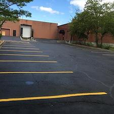 Patched, Crack Filled & Reapplied Stripes for parking lot in Overland Park, KS 1