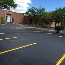 Patched, Crack Filled & Reapplied Stripes for parking lot in Overland Park, KS 0