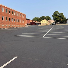 Sealcoating Church Parking Lot in Independence, MO 1